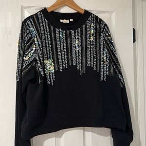 Black crewneck sweater